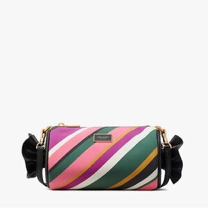 Kate Spade Candy wrapper bag. Excellent condition. Leather sides Satin around